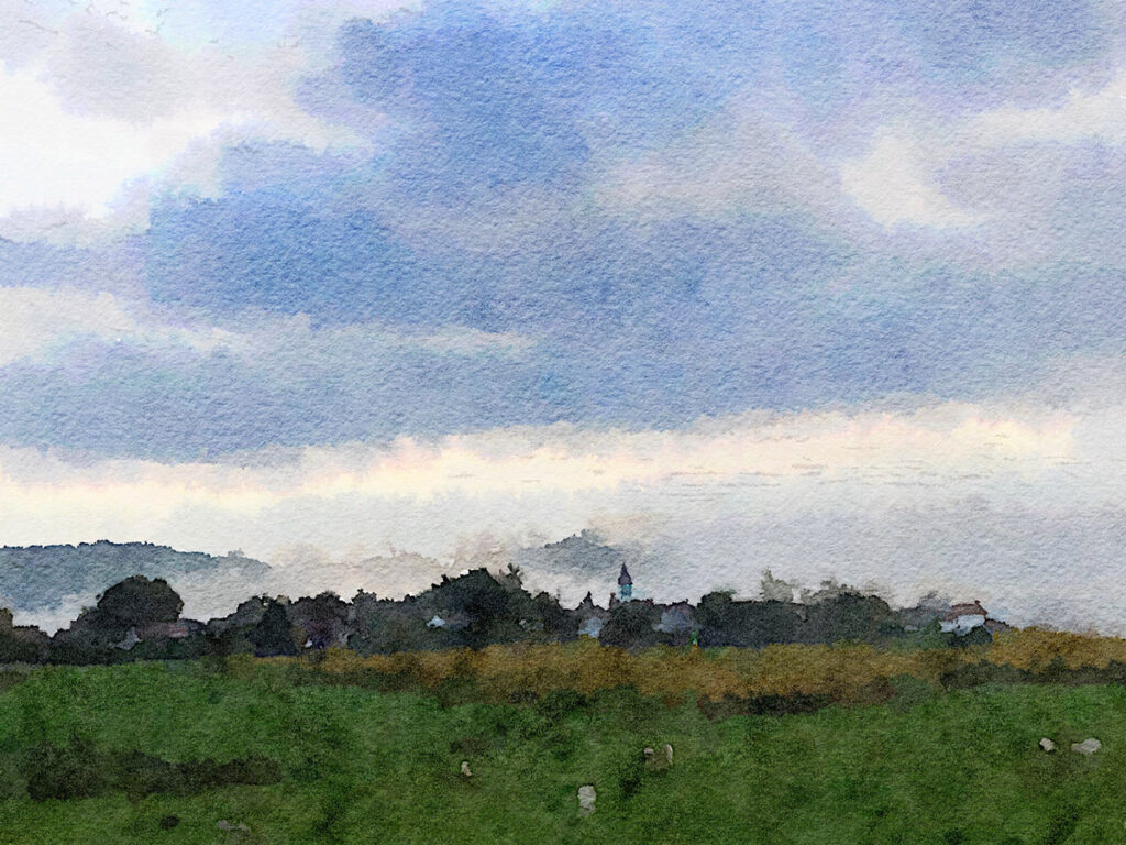 Das Dorf Aroue im Morgennebel